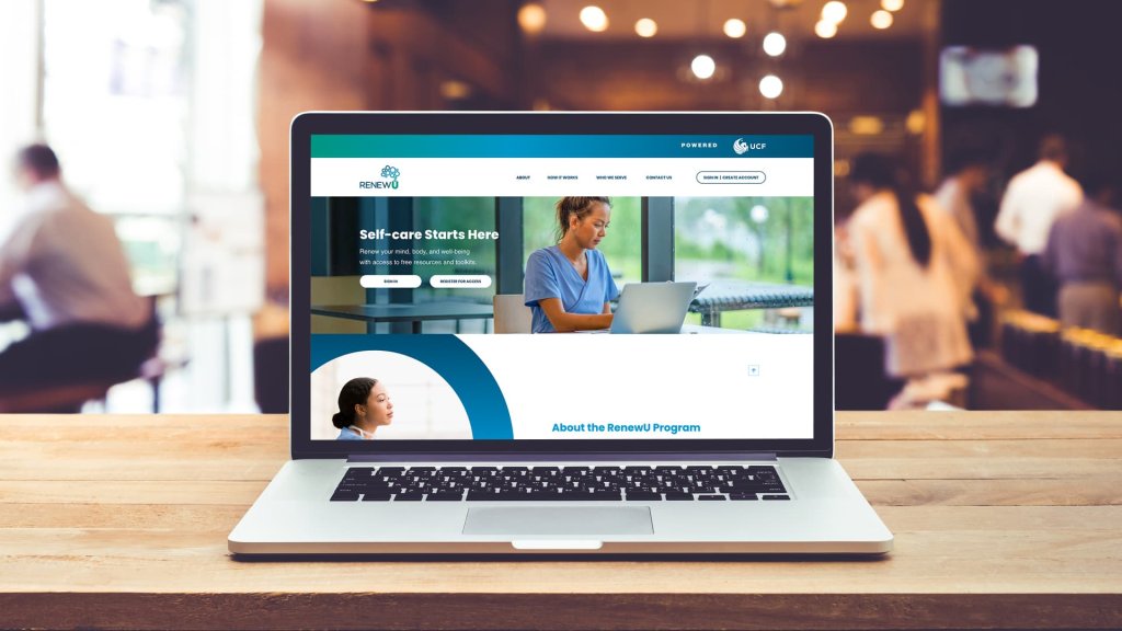 The RenewU website displayed on a laptop, showcasing the home page.